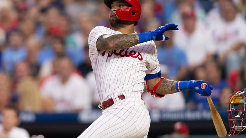 Sep 11, 2023; Philadelphia, Pennsylvania, USA; Philadelphia Phillies third baseman Edmundo Sosa (33) hits a two RBI double during the first inning against the Atlanta Braves at Citizens Bank Park. Mandatory Credit: Bill Streicher-USA TODAY Sports