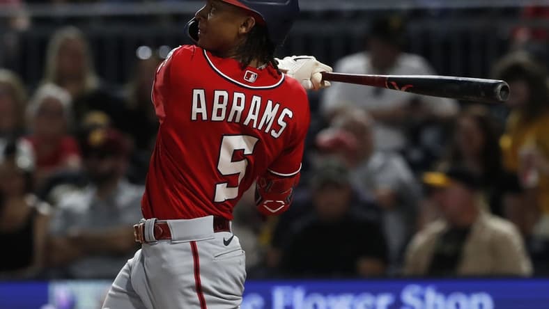 Sep 11, 2023; Pittsburgh, Pennsylvania, USA;  Washington Nationals shortstop CJ Abrams (5) hits a solo home run  against the Pittsburgh Pirates during the seventh inning at PNC Park. Mandatory Credit: Charles LeClaire-USA TODAY Sports