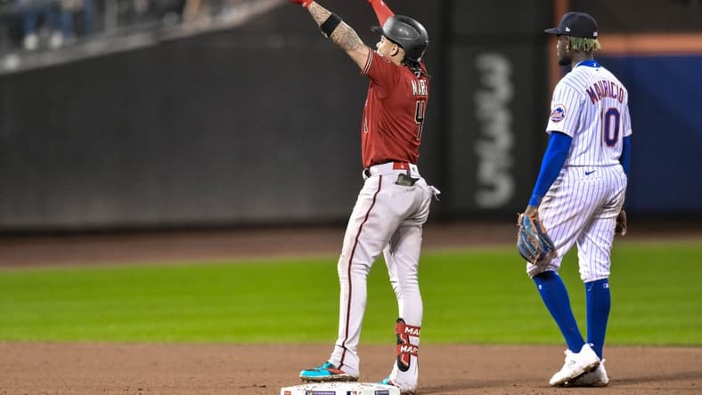 Sep 11, 2023; New York City, New York, USA; Arizona Diamondbacks second baseman Ketel Marte (4) reacts after hitting an RBI double against the New York Mets during the ninth inning at Citi Field. Mandatory Credit: John Jones-USA TODAY Sports