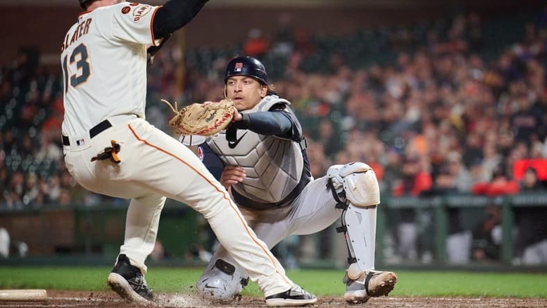 Sep 11, 2023; San Francisco, California, USA; Cleveland Guardians catcher Bo Naylor (23) tags out San Francisco Giants outfielder Austin Slater (13) on a force play at home plate during the seventh inning at Oracle Park. Mandatory Credit: Robert Edwards-USA TODAY Sports