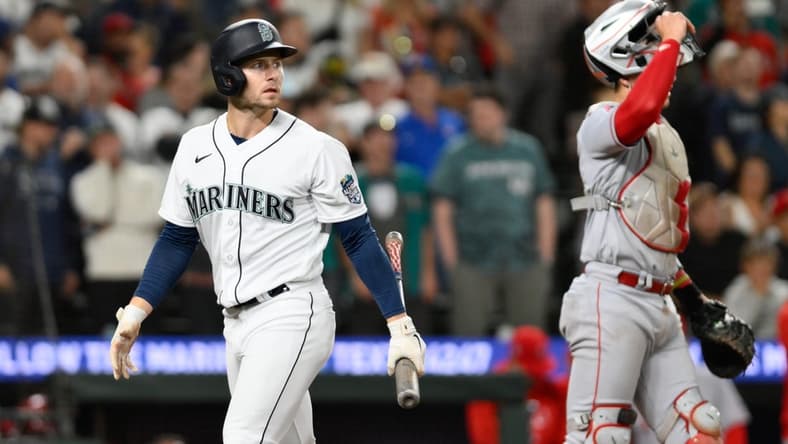 Sep 11, 2023; Seattle, Washington, USA; Seattle Mariners right fielder Jarred Kelenic (10) walks off the field after striking out to the Los Angeles Angels during the ninth inning at T-Mobile Park. Mandatory Credit: Steven Bisig-USA TODAY Sports