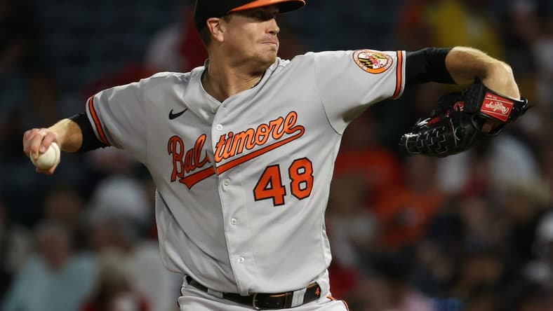 Sep 6, 2023; Anaheim, California, USA;  Baltimore Orioles starting pitcher Kyle Gibson (48) pitches during the game against the Los Angeles Angels at Angel Stadium. Mandatory Credit: Kiyoshi Mio-USA TODAY Sports