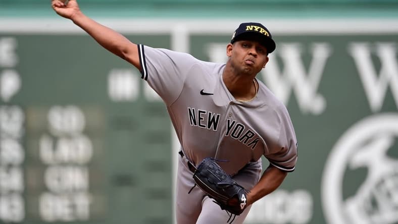 Sep 12, 2023; Boston, Massachusetts, USA; New York Yankees starting pitcher Randy Vasquez (98) pitches against the Boston Red Sox during the first inning at Fenway Park. Mandatory Credit: Eric Canha-USA TODAY Sports