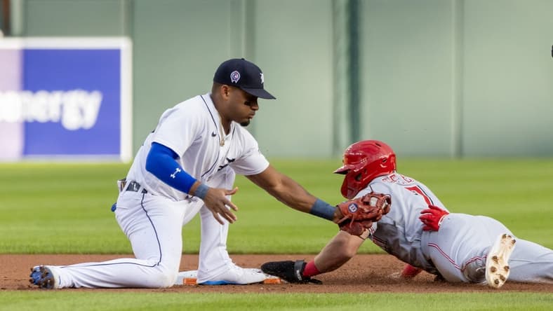 Sep 12, 2023; Detroit, Michigan, USA; Cincinnati Reds first baseman Spencer Steer (7) steals second base and beats the tag by Detroit Tigers shortstop Javier Baez (28) in the first inning at Comerica Park. Mandatory Credit: David Reginek-USA TODAY Sports