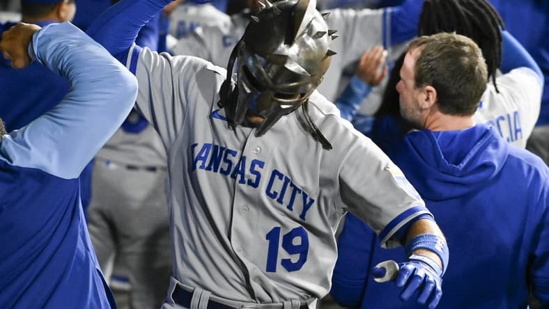 Sep 12, 2023; Chicago, Illinois, USA; Kansas City Royals second baseman Michael Massey (19) celebrates in the dugout  after hitting a three run home run against the Chicago White Sox during the second inning at Guaranteed Rate Field. Mandatory Credit: Matt Marton-USA TODAY Sports