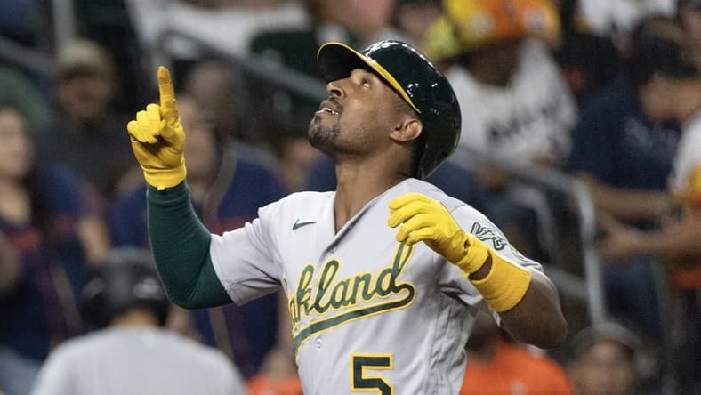Sep 12, 2023; Houston, Texas, USA; Oakland Athletics left fielder Tony Kemp (5) reacts while rounding the bases after hitting a home run against the Houston Astros in the fifth inning at Minute Maid Park. Mandatory Credit: Thomas Shea-USA TODAY Sports