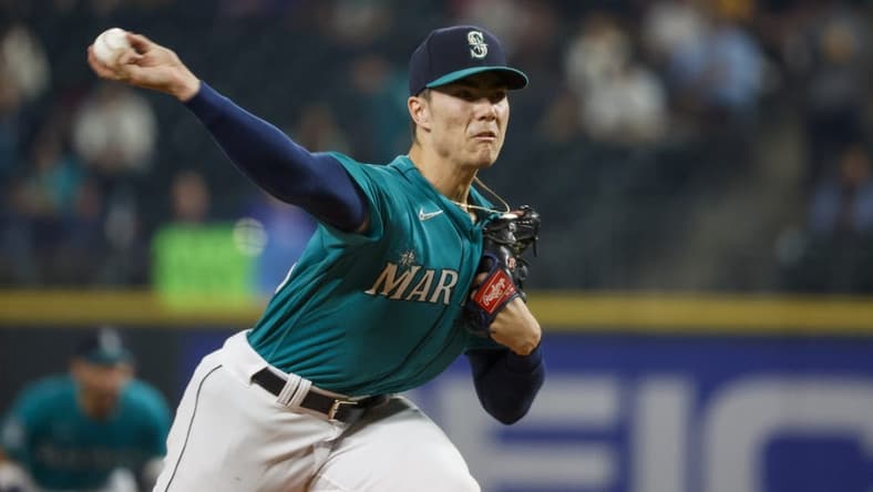 Sep 12, 2023; Seattle, Washington, USA; Seattle Mariners starting pitcher Bryan Woo (33) throws against the Los Angeles Angels during the first inning at T-Mobile Park. Mandatory Credit: Joe Nicholson-USA TODAY Sports