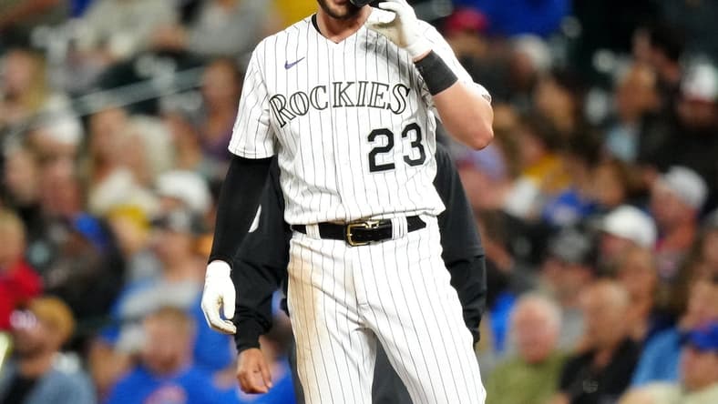 Sep 12, 2023; Denver, Colorado, USA; Colorado Rockies right fielder Kris Bryant (23) reacts to his RBI single in the fifth inning against the Colorado Rockies at Coors Field. Mandatory Credit: Ron Chenoy-USA TODAY Sports