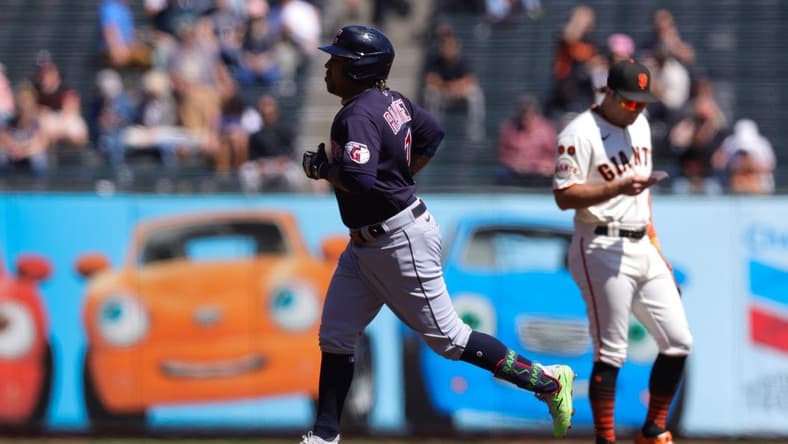 Sep 13, 2023; San Francisco, California, USA; Cleveland Guardians third baseman Jose Ramirez (11) hits a two run home run during the first inning against the San Francisco Giants at Oracle Park. Mandatory Credit: Sergio Estrada-USA TODAY Sports