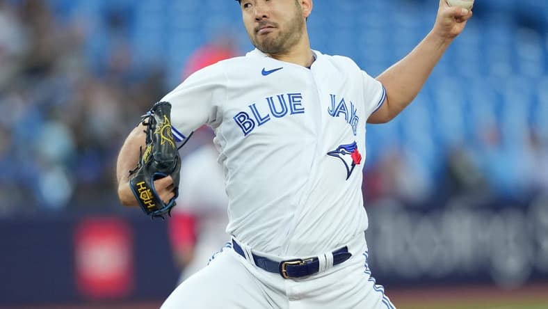 Sep 13, 2023; Toronto, Ontario, CAN; Toronto Blue Jays starting pitcher Yusei Kikuchi (16) throws a pitch against the Texas Rangers during the first inning at Rogers Centre. Mandatory Credit: Nick Turchiaro-USA TODAY Sports