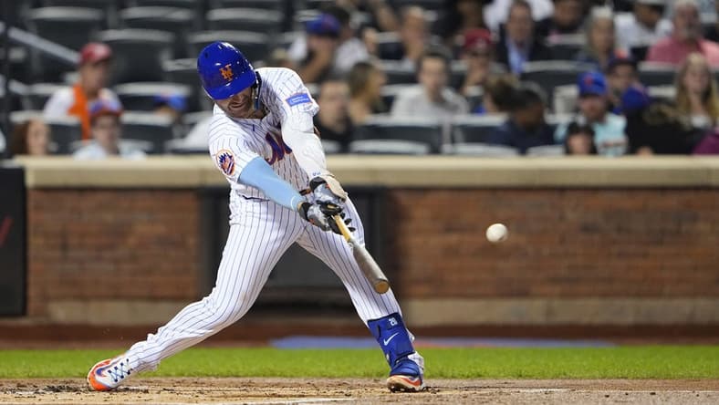Sep 13, 2023; New York City, New York, USA; New York Mets first baseman Pete Alonso (20) hits an RBI single against the Arizona Diamondbacks during the first inning at Citi Field. Mandatory Credit: Gregory Fisher-USA TODAY Sports