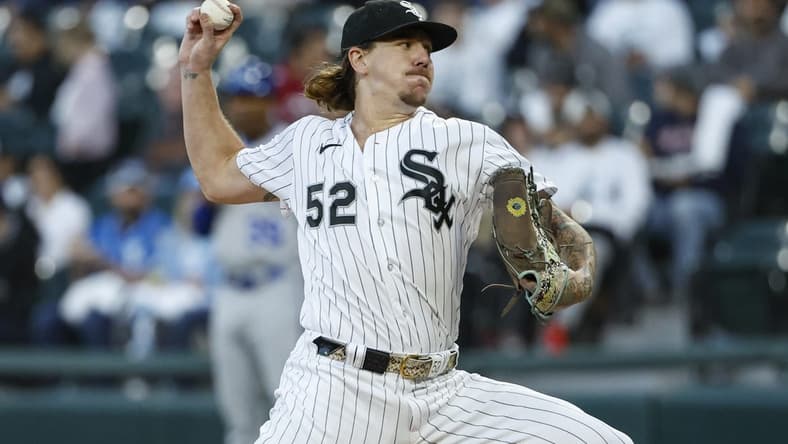 Sep 13, 2023; Chicago, Illinois, USA; Chicago White Sox starting pitcher Mike Clevinger (52) delivers a pitch against the Kansas City Royals during the first inning at Guaranteed Rate Field. Mandatory Credit: Kamil Krzaczynski-USA TODAY Sports