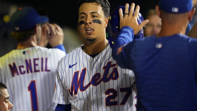 Sep 13, 2023; New York City, New York, USA; New York Mets designated hitter Mark Vientos (27) is congratulated by teammates for hitting a home run against the Arizona Diamondbacks during the sixth inning at Citi Field. Mandatory Credit: Gregory Fisher-USA TODAY Sports