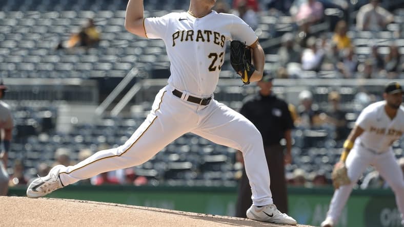 Sep 14, 2023; Pittsburgh, Pennsylvania, USA; Pittsburgh Pirates starting pitcher Mitch Keller (23) delivers a pitch against the Washington Nationals during the first inning at PNC Park. Mandatory Credit: Charles LeClaire-USA TODAY Sports