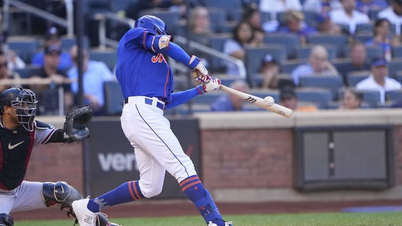 Sep 14, 2023; New York City, New York, USA; New York Mets center fielder Brandon Nimmo (9) hits an RBI double against the Arizona Diamondbacks during the third inning at Citi Field. Mandatory Credit: Gregory Fisher-USA TODAY Sports