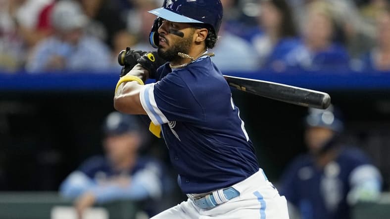 Sep 15, 2023; Kansas City, Missouri, USA; Kansas City Royals left fielder MJ Melendez (21) hits a single during the first inning against the Houston Astros at Kauffman Stadium. Mandatory Credit: Jay Biggerstaff-USA TODAY Sports