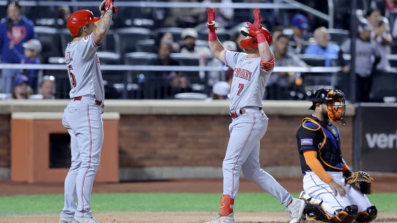Sep 15, 2023; New York City, New York, USA; Cincinnati Reds first baseman Spencer Steer (7) celebrates his two run home run against the New York Mets with third baseman Nick Senzel (15) during the sixth inning at Citi Field. Mandatory Credit: Brad Penner-USA TODAY Sports