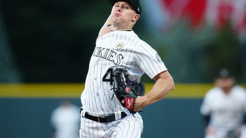 Sep 15, 2023; Denver, Colorado, USA; Colorado Rockies starting pitcher Chase Anderson (45) delivers a pitch in the first inning against the San Francisco Giants at Coors Field. Mandatory Credit: Ron Chenoy-USA TODAY Sports