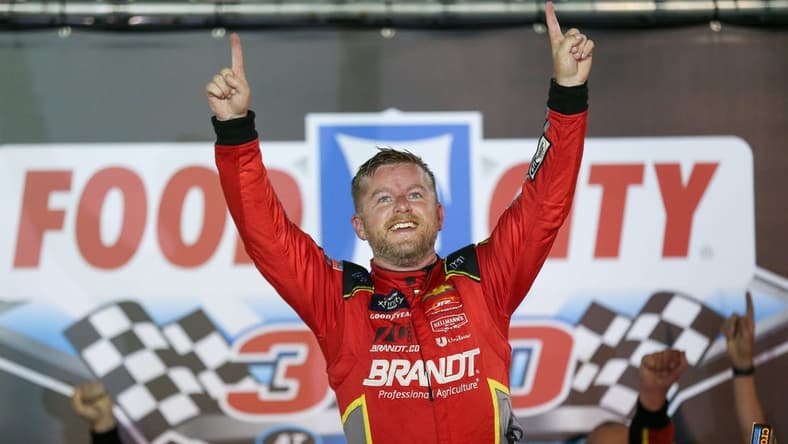 Sep 15, 2023; Bristol, Tennessee, USA; NASCAR Xfinity Series driver Justin Allgaier (7) celebrates after winning the race at Bristol Motor Speedway. Mandatory Credit: Randy Sartin-USA TODAY Sports