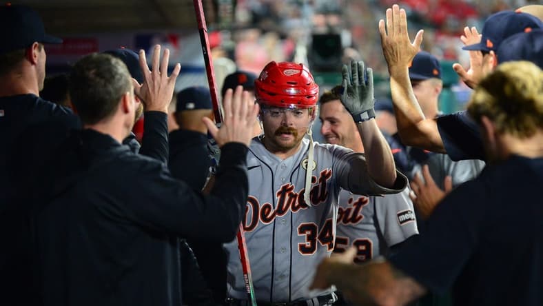 Sep 15, 2023; Anaheim, California, USA; Detroit Tigers catcher Jake Rogers (34) is greeted hitting a solo home run against the Los Angeles Angels during the sixth inning at Angel Stadium. Mandatory Credit: Gary A. Vasquez-USA TODAY Sports