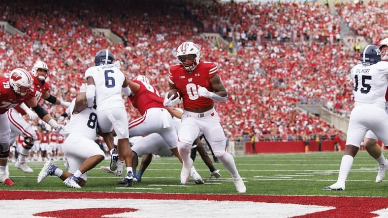 Sep 16, 2023; Madison, Wisconsin, USA;  Wisconsin Badgers running back Braelon Allen (0) rushes for a touchdown during the third quarter against the Georgia Southern Eagles at Camp Randall Stadium. Mandatory Credit: Jeff Hanisch-USA TODAY Sports