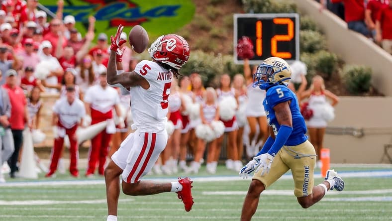 Sep 16, 2023; Tulsa, Oklahoma, USA; Oklahoma's Andrel Anthony (5) catches a pass for a first down in the first quarter against the Tulsa Golden Hurricane at Skelly Field at H.A. Chapman Stadium. Mandatory Credit: Nathan J. Fish-USA TODAY Sports
