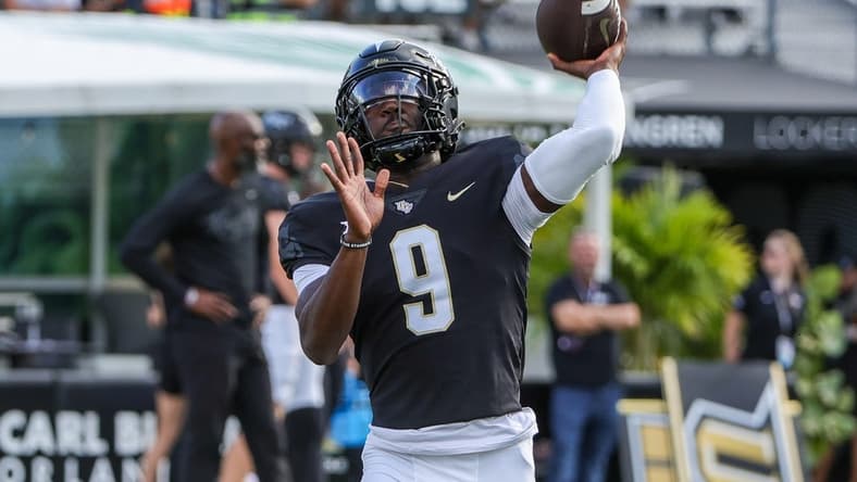 Sep 16, 2023; Orlando, Florida, USA; UCF Knights quarterback Timmy McClain (9) warms up before the game against the Villanova Wildcats at FBC Mortgage Stadium. Mandatory Credit: Mike Watters-USA TODAY Sports