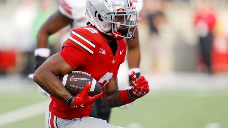 Sep 16, 2023; Columbus, Ohio, USA; Ohio State Buckeyes wide receiver Emeka Egbuka (2) runs for a touchdown during the second quarter against the Western Kentucky Hilltoppers at Ohio Stadium. Mandatory Credit: Joseph Maiorana-USA TODAY Sports