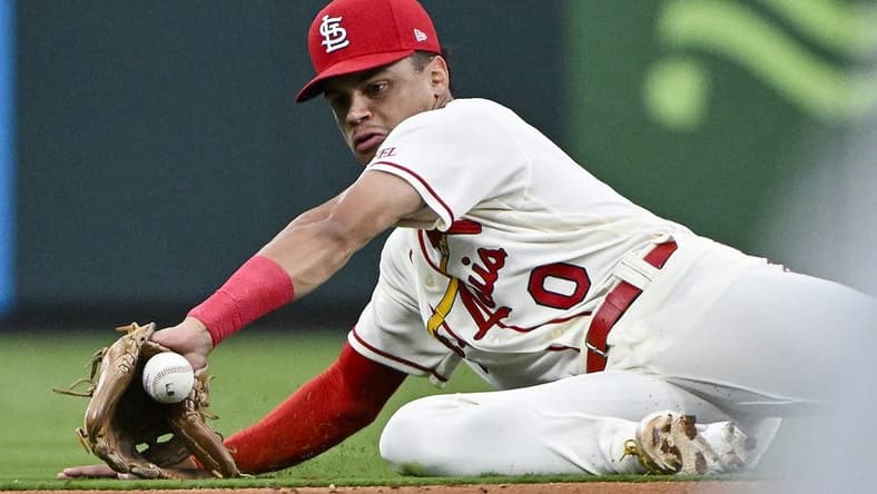 Sep 16, 2023; St. Louis, Missouri, USA;  St. Louis Cardinals shortstop Masyn Winn (0) knocks down a ground ball against the Philadelphia Phillies during the second inning at Busch Stadium. Mandatory Credit: Jeff Curry-USA TODAY Sports