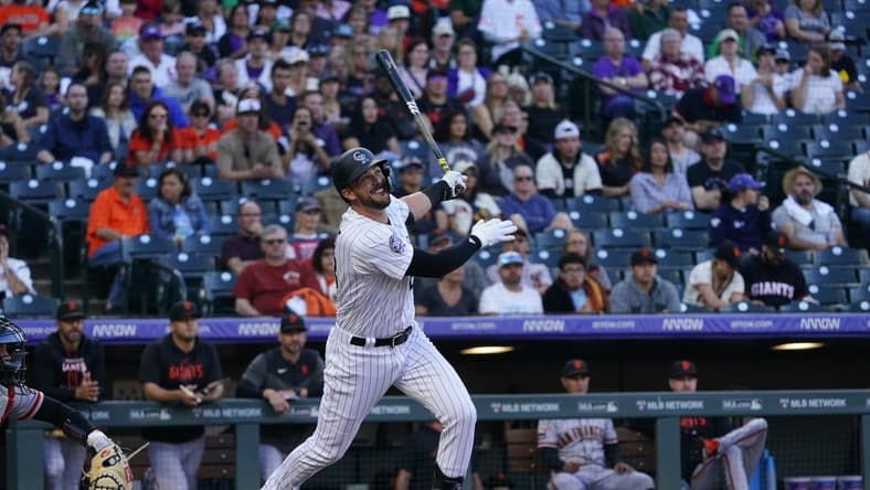 Sep 16, 2023; Denver, Colorado, USA; Colorado Rockies right fielder Kris Bryant (23) watches his RBI double to right field in the first inning at Coors Field. Mandatory Credit: Michael Madrid-USA TODAY Sports