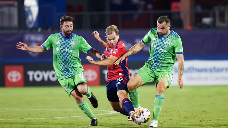 Sep 16, 2023; Frisco, Texas, USA; Seattle Sounders midfielder Joao Paulo (6) and Seattle Sounders forward Jordan Morris (13) battle for the ball with FC Dallas midfielder Paxton Pomykal (19) during the first half at Toyota Stadium. Mandatory Credit: Kevin Jairaj-USA TODAY Sports