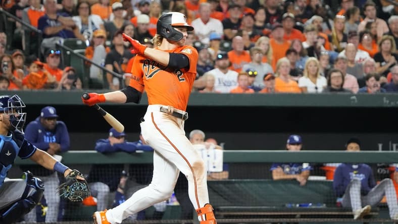Sep 16, 2023; Baltimore, Maryland, USA; Baltimore Orioles shortstop Gunnar Henderson (2) hits an RBI single against the Tampa Bay Rays during the fourth inning at Oriole Park at Camden Yards. Mandatory Credit: Gregory Fisher-USA TODAY Sports