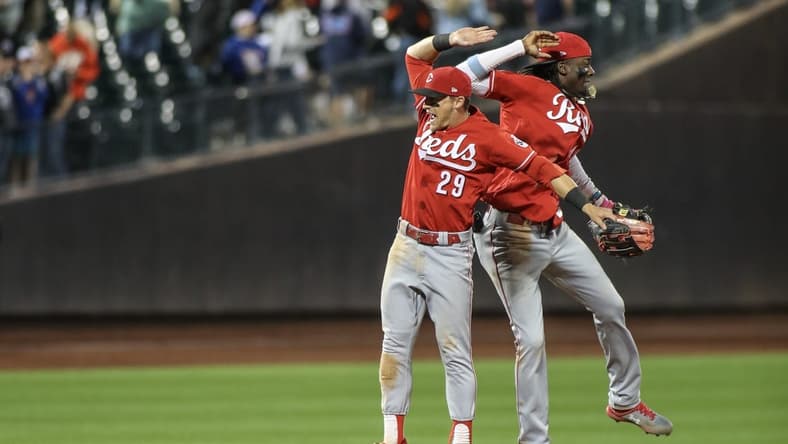 Sep 16, 2023; New York City, New York, USA; Cincinnati Reds center fielder TJ Friedl (29) and shortstop Elly De La Cruz (44) celebrate after defeating the New York Mets 3-2 at Citi Field. Mandatory Credit: Wendell Cruz-USA TODAY Sports