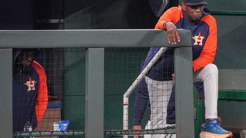Sep 16, 2023; Kansas City, Missouri, USA; Houston Astros manager Dusty Baker Jr. (12) watches play from the dugout against the Kansas City Royals in the eighth inning at Kauffman Stadium. Mandatory Credit: Denny Medley-USA TODAY Sports
