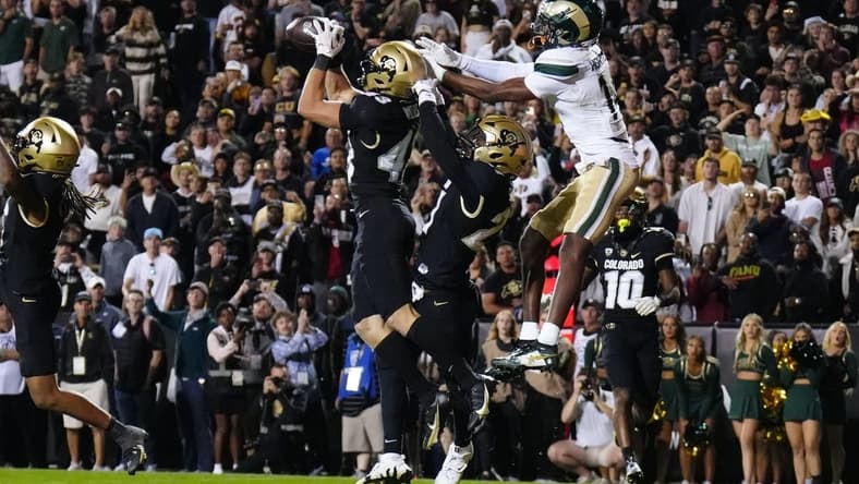 Sep 16, 2023; Boulder, Colorado, USA; Colorado Buffaloes safety Trevor Woods (43) intercepts the ball to end the double overtime game against the Colorado State Rams at Folsom Field. Mandatory Credit: Ron Chenoy-USA TODAY Sports