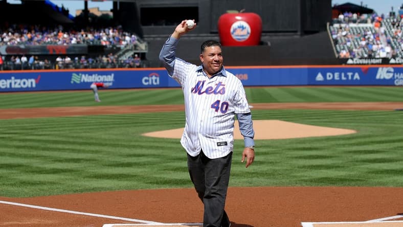 Sep 17, 2023; New York City, New York, USA; New York Mets former pitcher Bartolo Colon waves after throwing out a ceremonial first pitch before a game against the Cincinnati Reds at Citi Field. Colon today retired from baseball as a Met. Mandatory Credit: Brad Penner-USA TODAY Sports