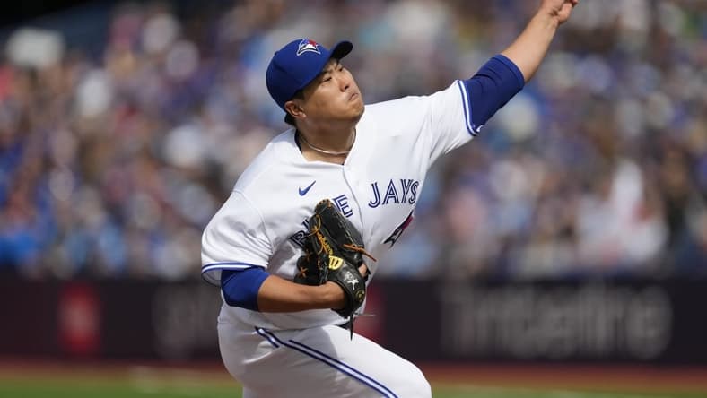 Sep 17, 2023; Toronto, Ontario, CAN; Toronto Blue Jays starting pitcher Hyun Jin Ryu (99) pitches to the Boston Red Sox during the third inning at Rogers Centre. Mandatory Credit: John E. Sokolowski-USA TODAY Sports