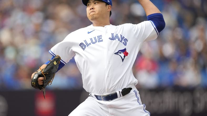 Sep 17, 2023; Toronto, Ontario, CAN; Toronto Blue Jays starting pitcher Hyun Jin Ryu (99) pitches to the Boston Red Sox during the first inning at Rogers Centre. Mandatory Credit: John E. Sokolowski-USA TODAY Sports