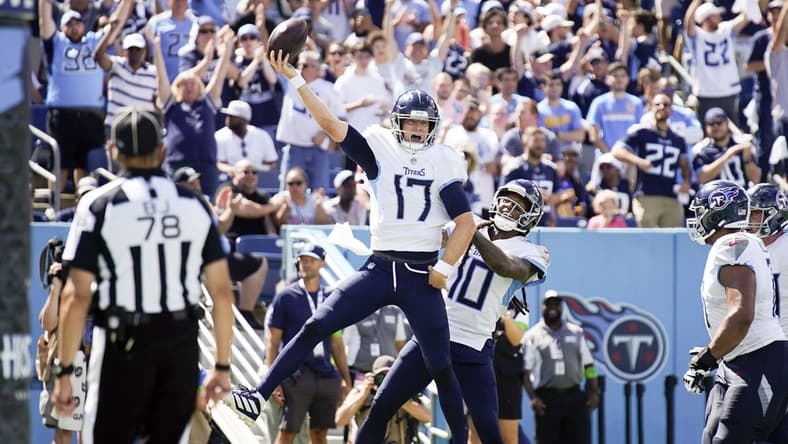 Sep 17, 2023; Nashville, Tennessee, USA; Tennessee Titans quarterback Ryan Tannehill (17) celebrates his touchdown in the third quarter at Nissan Stadium. Mandatory Credit: Denny Simmons-USA TODAY Sports