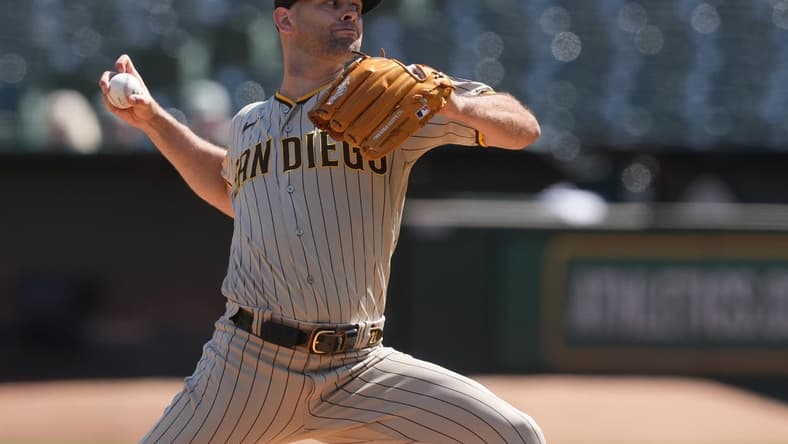 Sep 17, 2023; Oakland, California, USA; San Diego Padres starting pitcher Nick Martinez (21) throws a pitch against the Oakland Athletics during the first inning at Oakland-Alameda County Coliseum. Mandatory Credit: Darren Yamashita-USA TODAY Sports