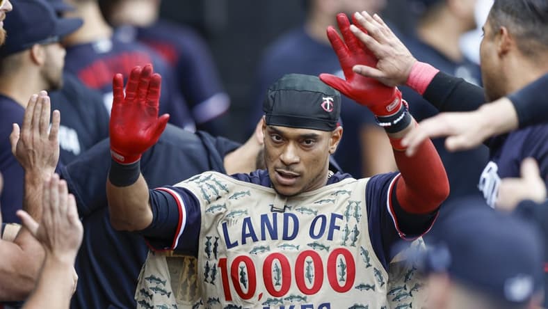 Sep 17, 2023; Chicago, Illinois, USA; Minnesota Twins second baseman Jorge Polanco (11) celebrates with teammates in the dugout after hitting a solo home run against the Chicago White Sox during the eight inning at Guaranteed Rate Field. Mandatory Credit: Kamil Krzaczynski-USA TODAY Sports