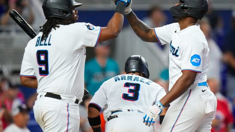 Sep 17, 2023; Miami, Florida, USA; Miami Marlins designated hitter Jorge Soler, right, celebrates with first baseman Josh Bell (9) after hitting a home run against the Atlanta Braves during the sixth inning at loanDepot Park. Mandatory Credit: Rich Storry-USA TODAY Sports