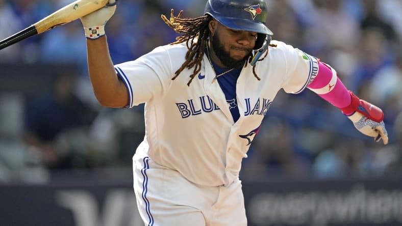 Sep 17, 2023; Toronto, Ontario, CAN; Toronto Blue Jays first baseman Vladimir Guerrero Jr. (27) reacts after flying out to the Boston Red Sox during the eighth inning at Rogers Centre. Mandatory Credit: John E. Sokolowski-USA TODAY Sports