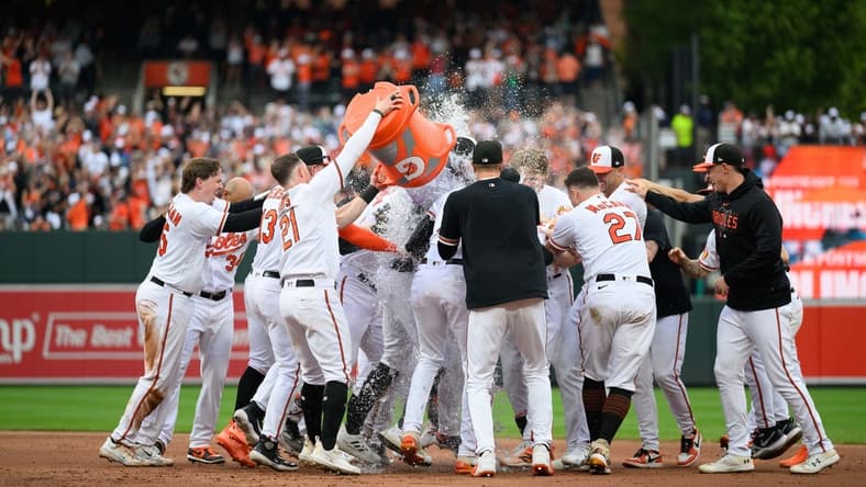 Sep 17, 2023; Baltimore, Maryland, USA; The Baltimore Orioles celebrate after winning the game against the Tampa Bay Rays at Oriole Park at Camden Yards. Mandatory Credit: Reggie Hildred-USA TODAY Sports