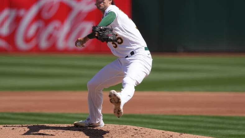 Sep 17, 2023; Oakland, California, USA; Oakland Athletics starting pitcher Joe Boyle (35) throws a pitch against the San Diego Padres during the third inning at Oakland-Alameda County Coliseum. Mandatory Credit: Darren Yamashita-USA TODAY Sports