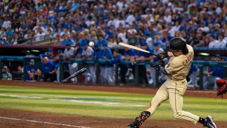 Sep 17, 2023; Phoenix, Arizona, USA; Arizona Diamondbacks outfielder Corbin Carroll (7) breaks his bat during his at bat in the fourth inning against the Chicago Cubs at Chase Field. Mandatory Credit: Allan Henry-USA TODAY Sports