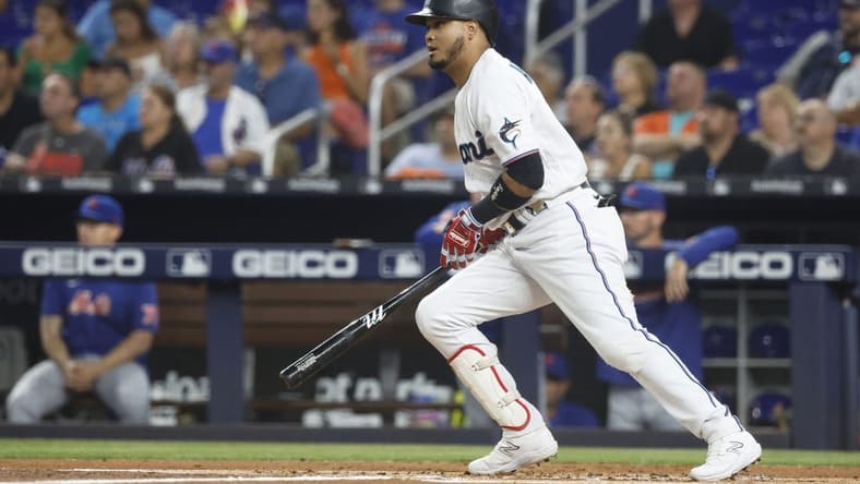 Sep 18, 2023; Miami, Florida, USA; Miami Marlins second baseman Luis Arraez (3) gets his 200th hit on the season against the New York Mets at loanDepot Park. Mandatory Credit: Rhona Wise-USA TODAY Sports