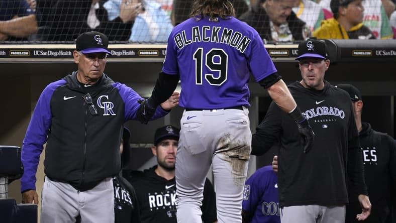 Sep 18, 2023; San Diego, California, USA; Colorado Rockies right fielder Charlie Blackmon (19) is congratulated at the dugout by manager Bud Black (left) after scoring a run against the San Diego Padres during the third inning at Petco Park. Mandatory Credit: Orlando Ramirez-USA TODAY Sports