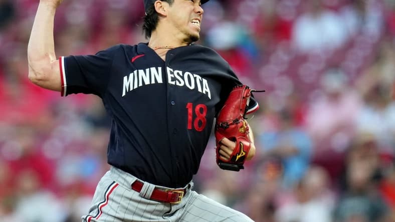 Minnesota Twins starting pitcher Kenta Maeda (18) delivers a pitch in the second inning of a baseball game against the Minnesota Twins, Tuesday, Sept. 19, 2023, at Great American Ball Park in Cincinnati.