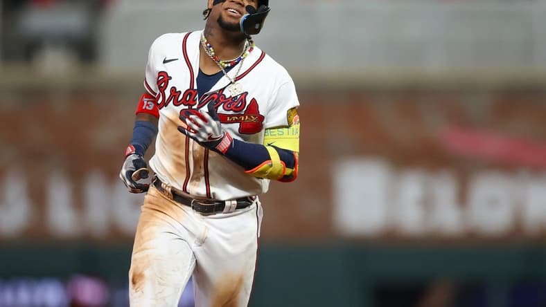 Sep 19, 2023; Atlanta, Georgia, USA; Atlanta Braves right fielder Ronald Acuna Jr. (13) celebrates after a home run against the Philadelphia Phillies in the sixth inning at Truist Park. Mandatory Credit: Brett Davis-USA TODAY Sports